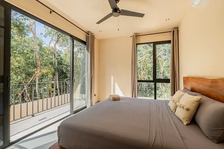 Casa Dalida bedroom suite with king bed and jungle balcony access