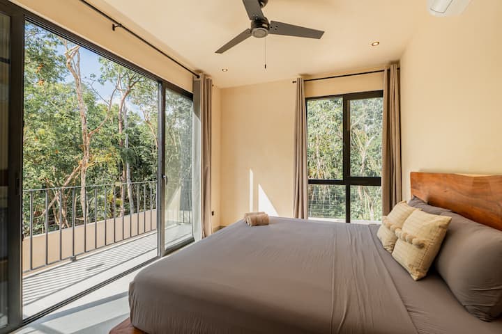 Casa Dalida bedroom suite with king bed and jungle balcony access