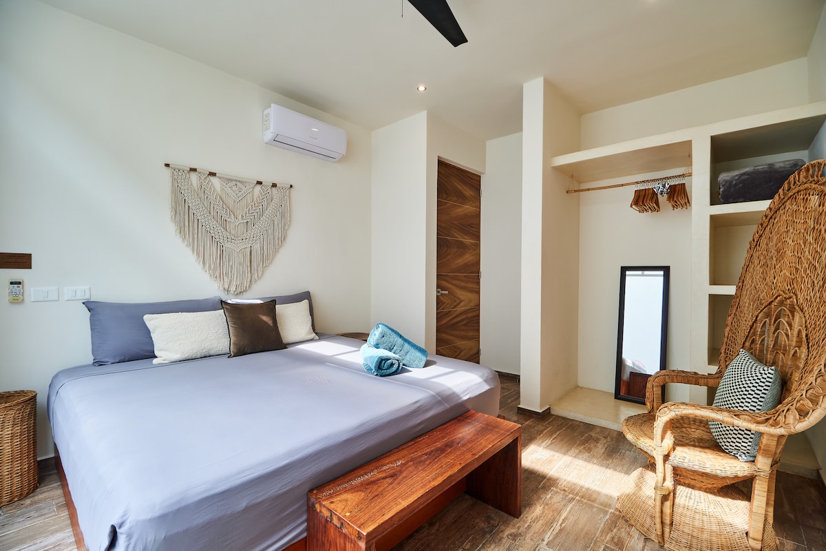 Casa Flamingo elegant bathroom with rainfall shower and modern fixtures in 3-bedroom villa