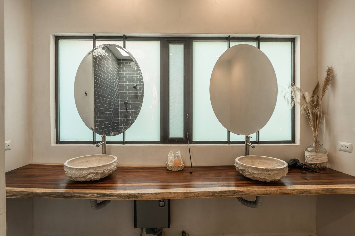 Casa Sueño master bathroom with double stone sinks