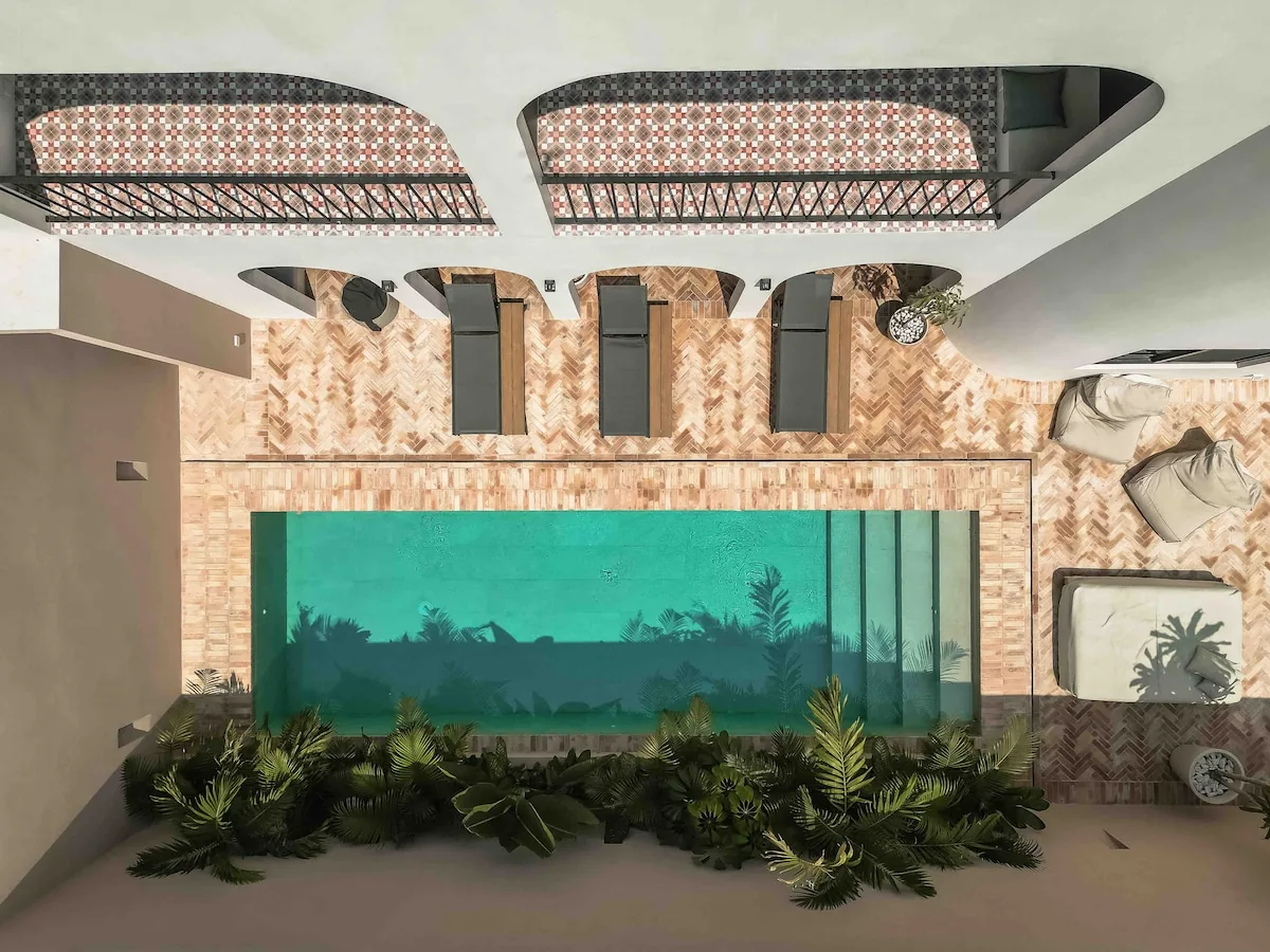 Casa Tabarka luxury swimming pool with modern design and tropical garden designed by Clémence