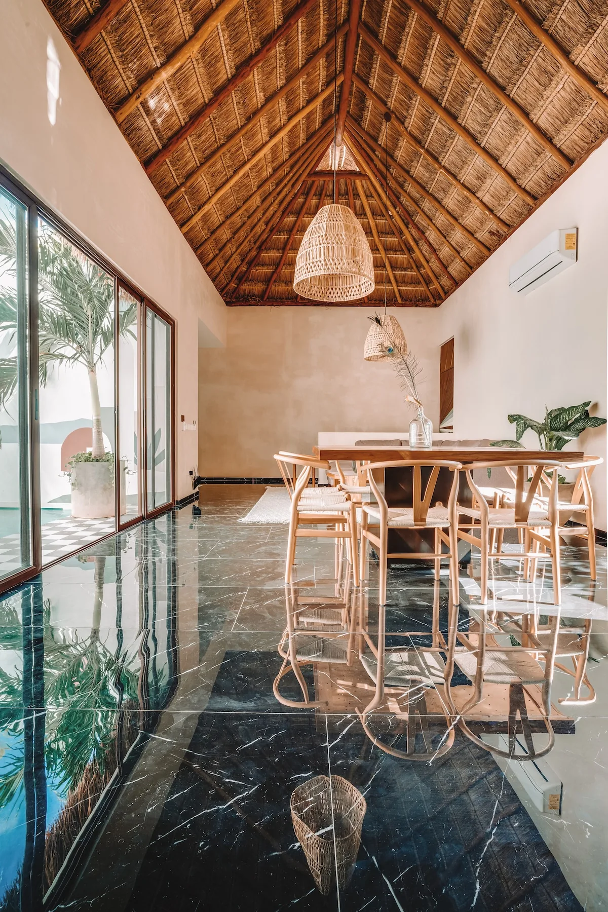 Casa Zorro spacious living area with luxurious modern furnishings and floor-to-ceiling windows